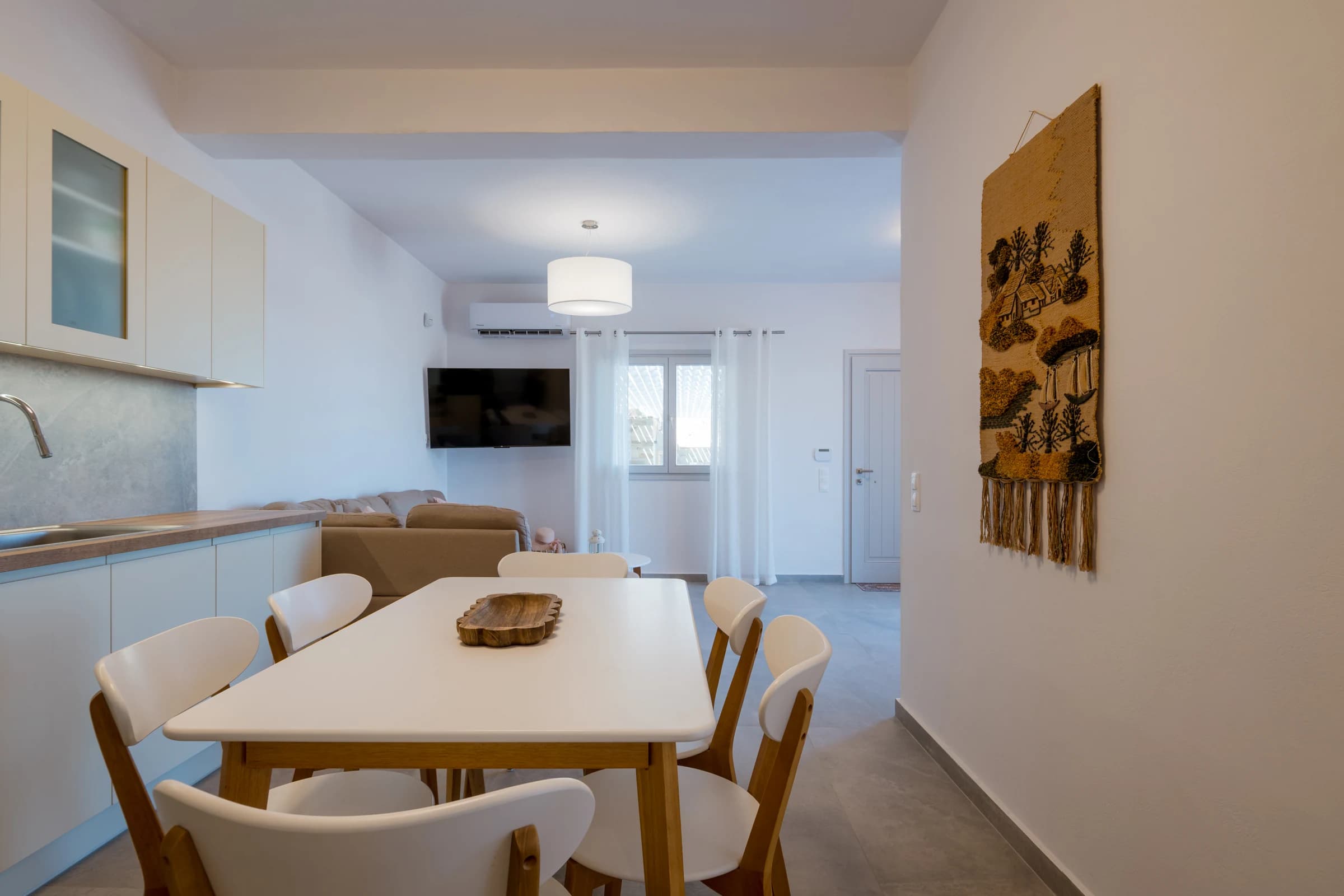Theasis Estate II — living, kitchen and dining space