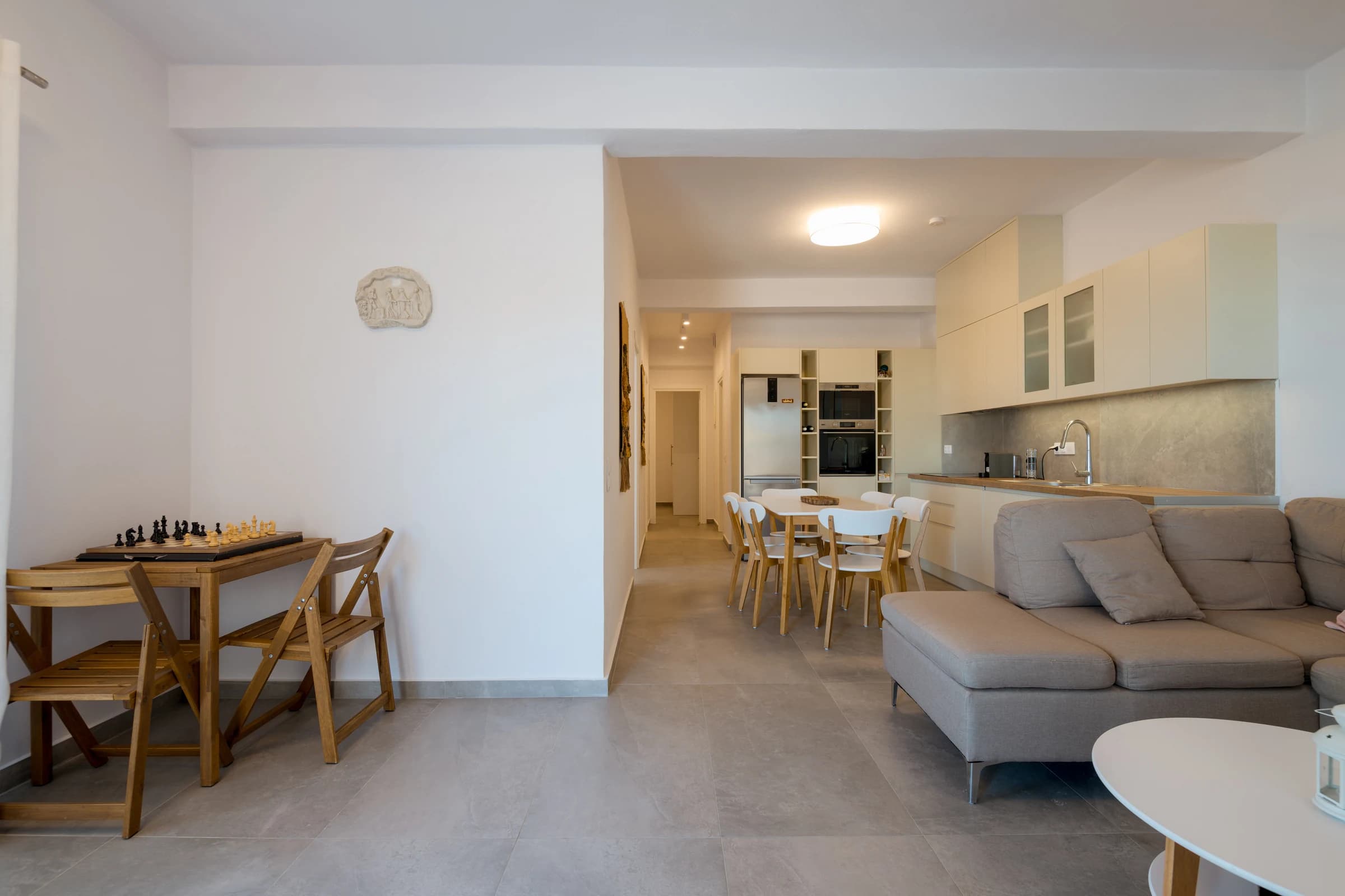 Theasis Estate II — living, kitchen and dining space