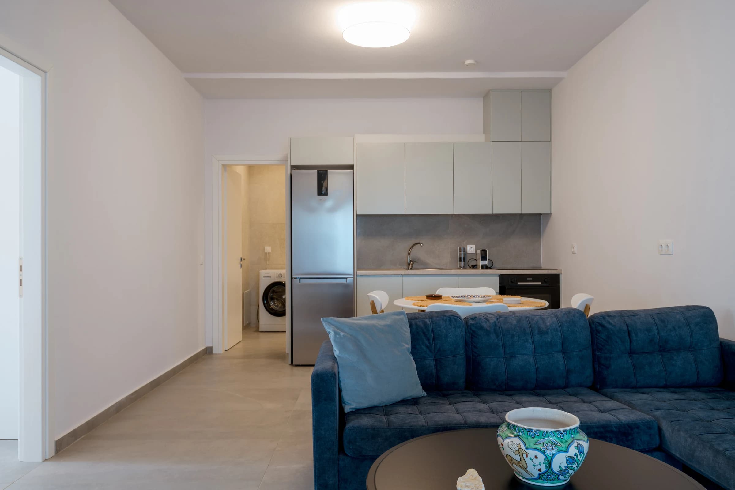 Theasis Estate II — living, kitchen and dining space