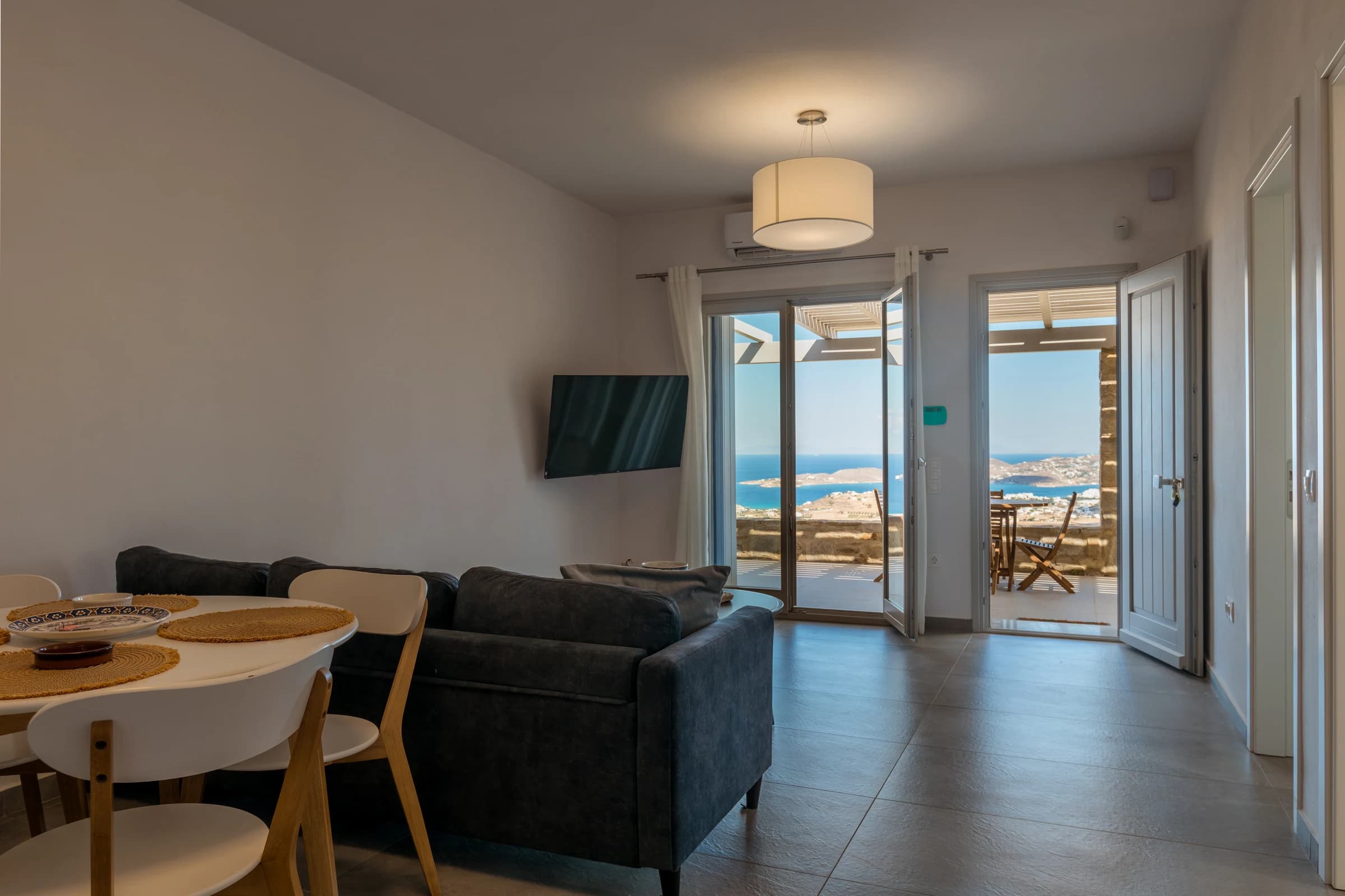 Theasis Estate II — living, kitchen and dining space