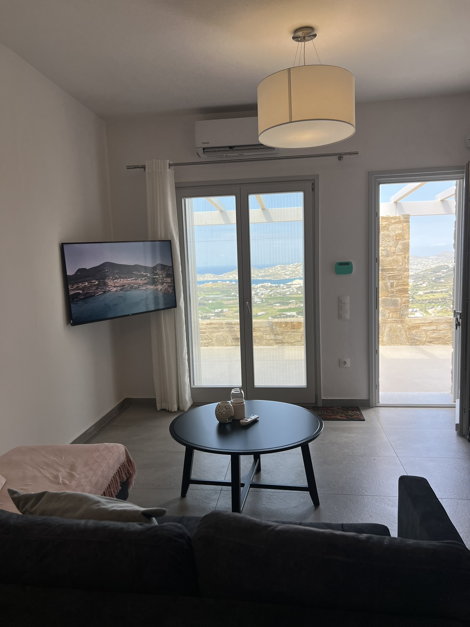 Terrace doorway and bay view at House Theasis II